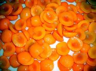 Половины нового урожая свежие и питательные законсервированные абрикоса в сиропе золотом Солнце